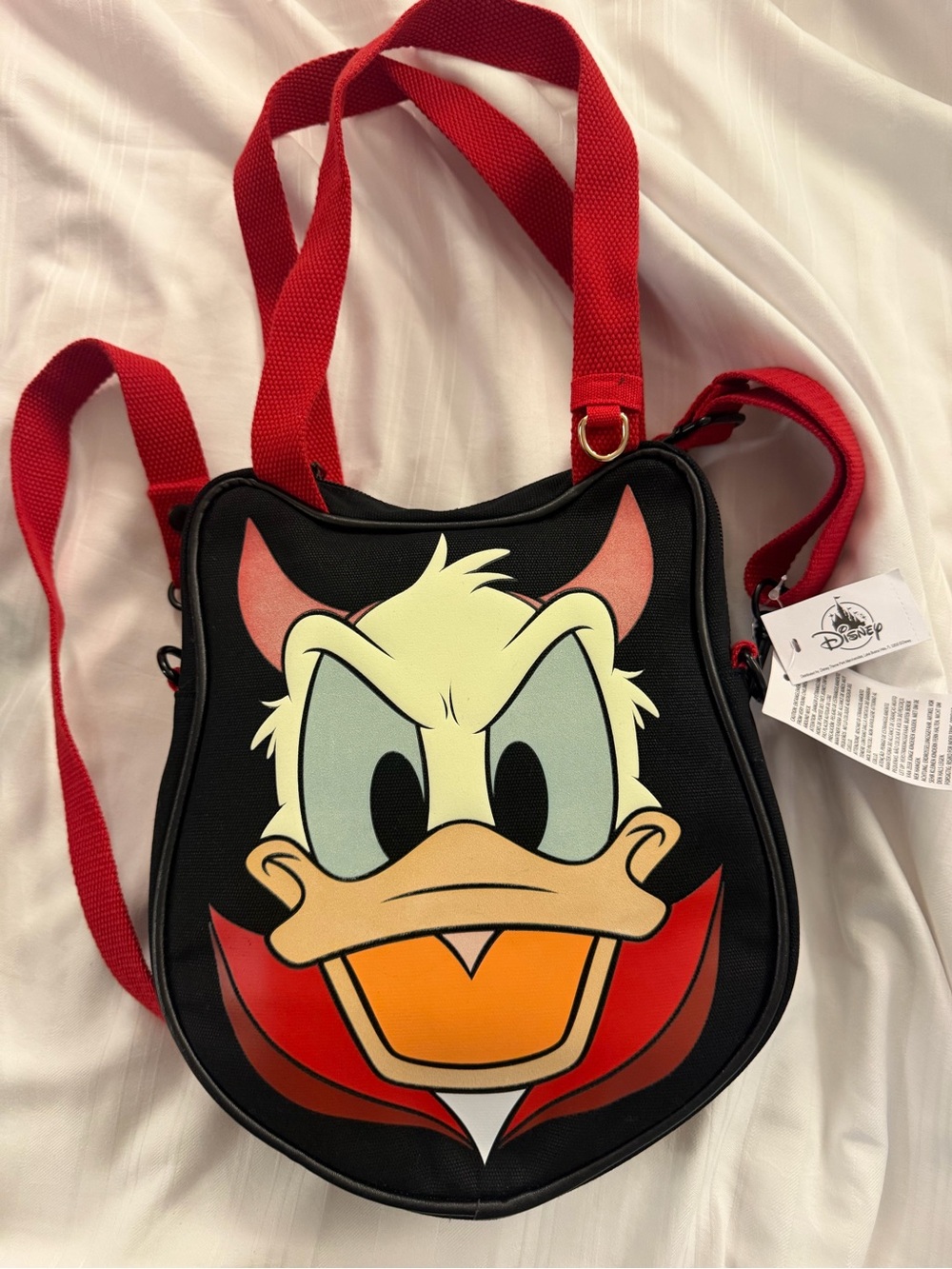 Disney Donald Duck Devil Face Crossbody Bag in Black and Red glow in dark